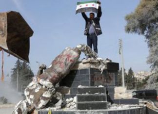 Demirci Kawa Heykelinin Yıkıldığı Efrin’de Ezidilerin Dilek Ağacı da Yakıldı